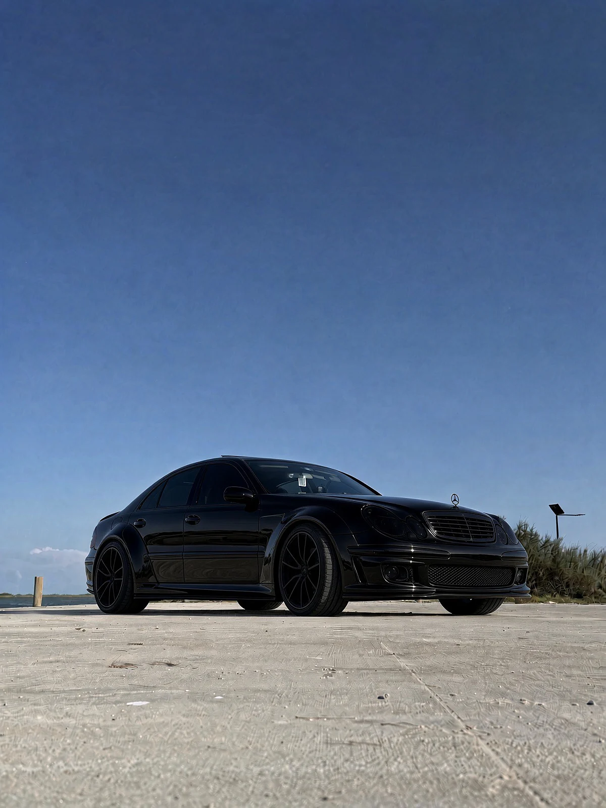 Black widebody Mercedes-Benz E500 W211